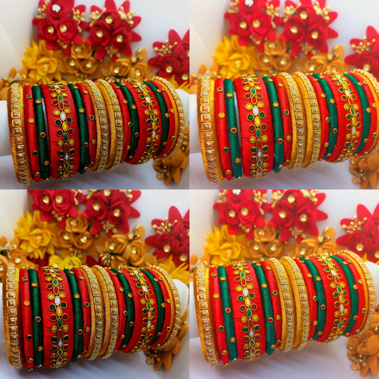 14Pcs Red, Green and Gold Color Silk Threaded Bangles with Matte and Glossy Kundan Stones